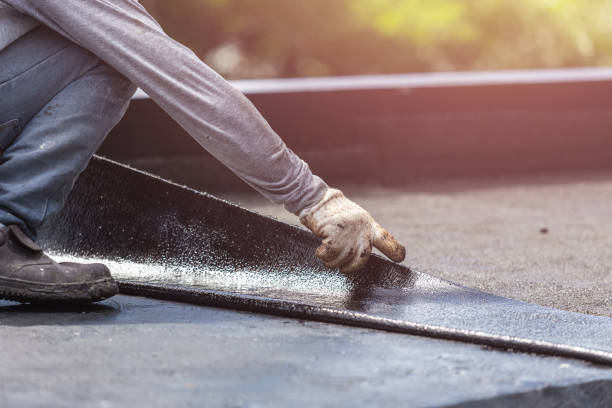 Professional Waterproofing technician working in Lena, IL
